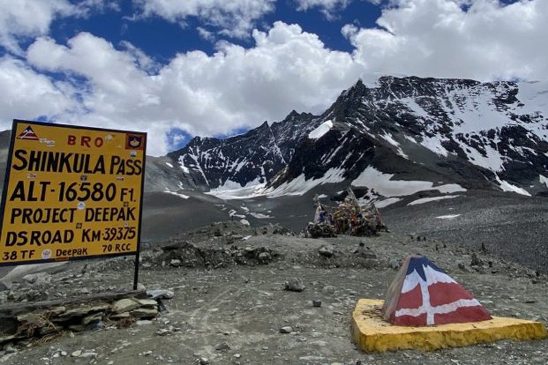 Hatchback taxi on a mountain road